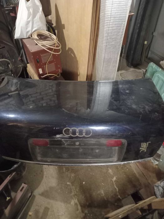 Ауди а4Кришка багажника,бампер,торпеда