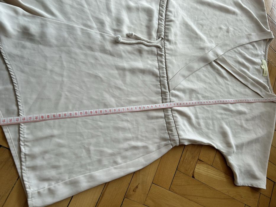 Damski kremowy kombinezon