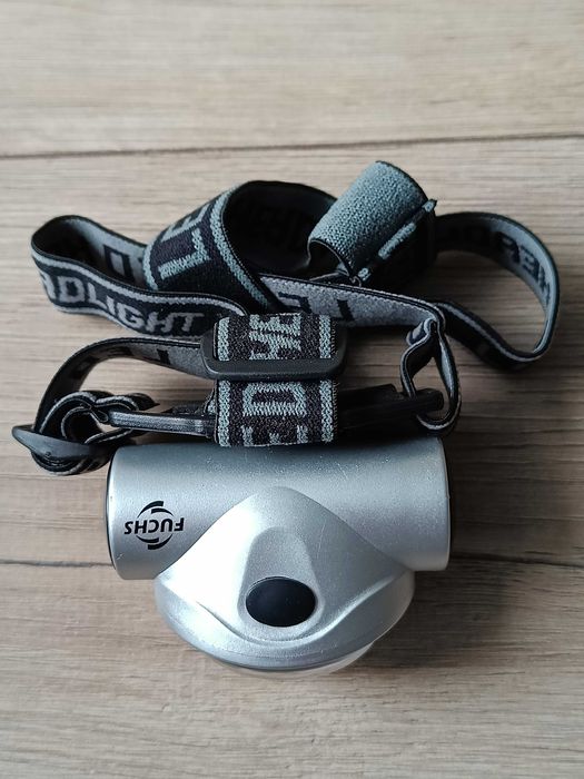 Kolekcjonerska latarka czołowa Sencor SLL 50 z logo Fuchs