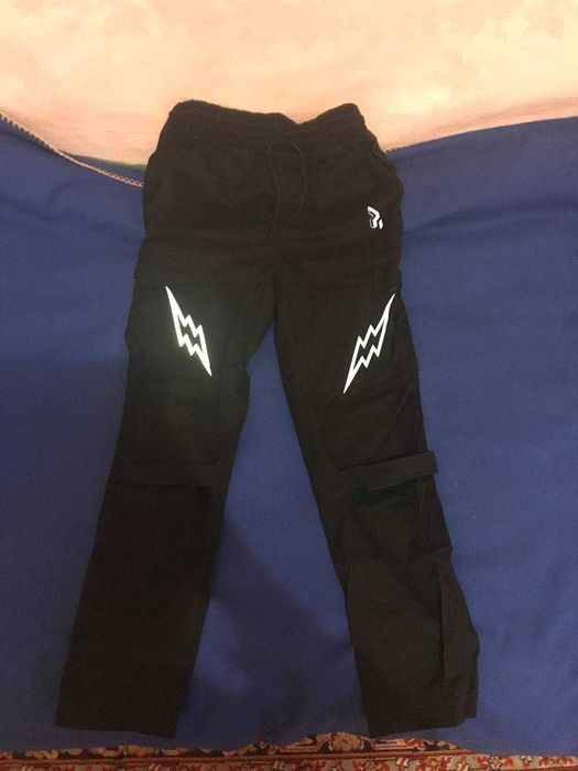 Черные штаны с молниями