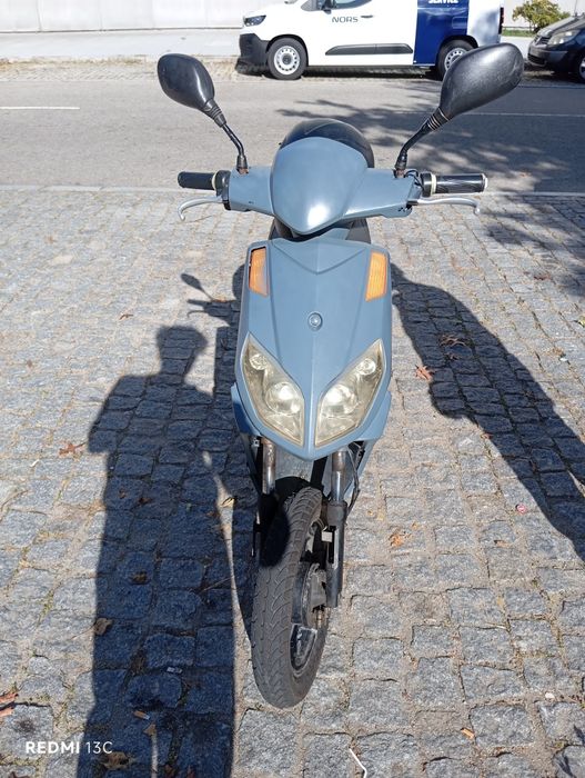 Mota elétrica bateria semi nova