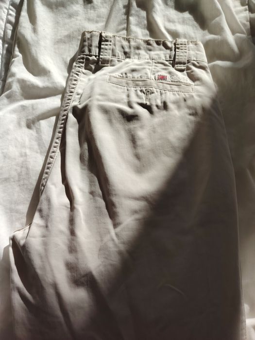 Calças cremes Lion Porsches