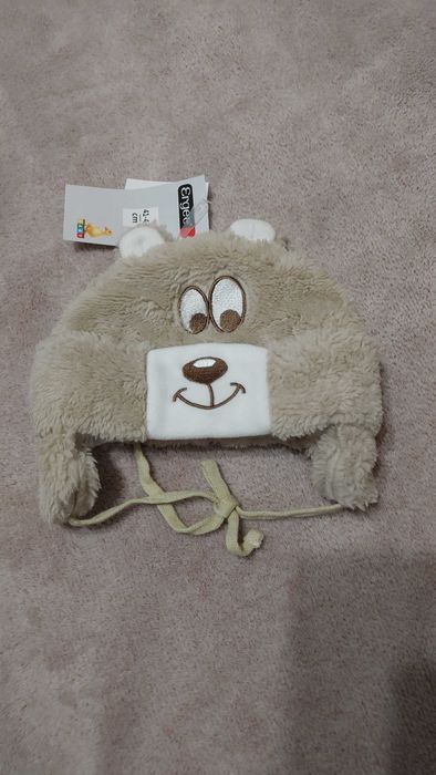 Тепла дитяча шапочка