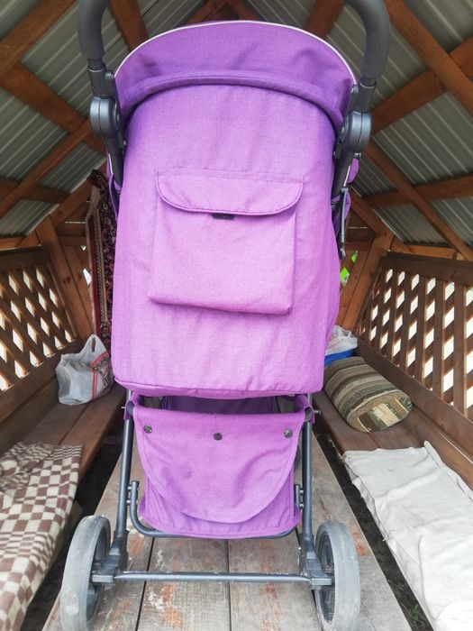 Дитяча прогулочная коляска