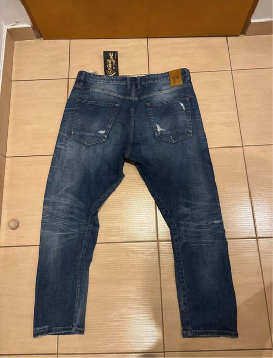 Jeansy Gianni Lupo 38/52 z dziurami