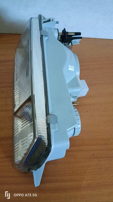 Farol Renault 9 / R11 Depo direito ótica 1987