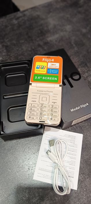 Telefon komórkowy Filjo 4 2.6 ekran 4 karty SIM  nowy