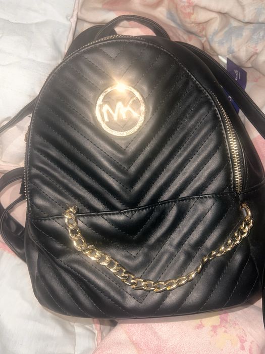 Mochila MK em bom estdo