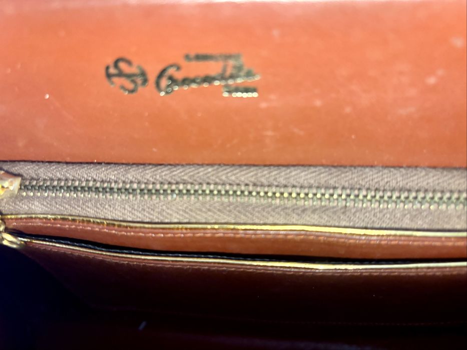 Mala em pele de crocodilo verdadeira