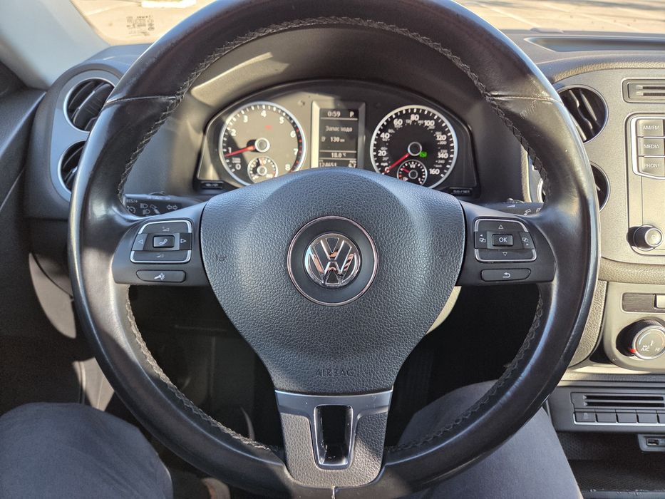 Volkswagen Tiguan 2015 VIN WVGAV7AX4GW512213 фото оголошення 3 з 24