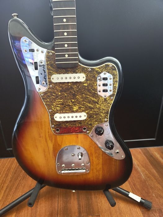 Troco escudo/pickguard Jaguar