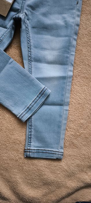 Nowe spodnie jeansowe coccodrillo r. 92