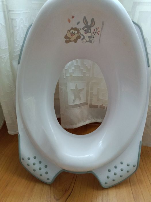 Redutor de sanita criança