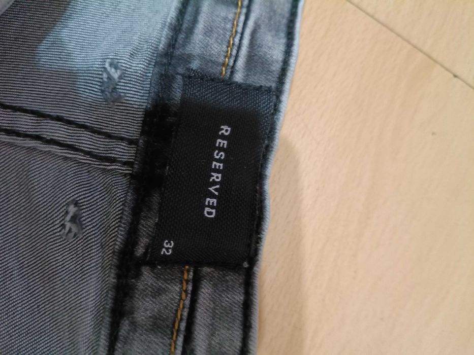 Jeansy damskie Reserved