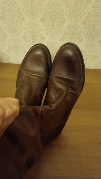 Шкіряні високі чобітки