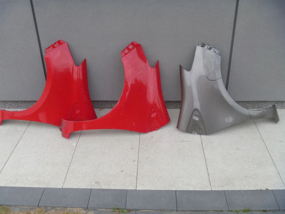 TOYOTA YARIS III BŁOTNIK LEWY PRAWY ORYGINAŁ