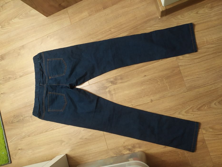 Spodnie damskie jeansy Clock house 38