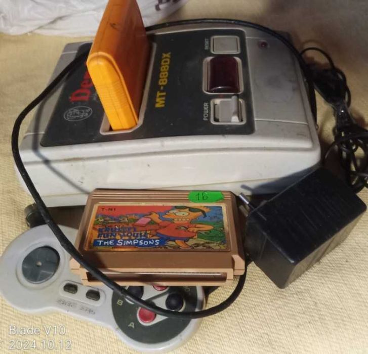 Гра "денді" 8 бітна робоча + 2 касети з багато  іграми .