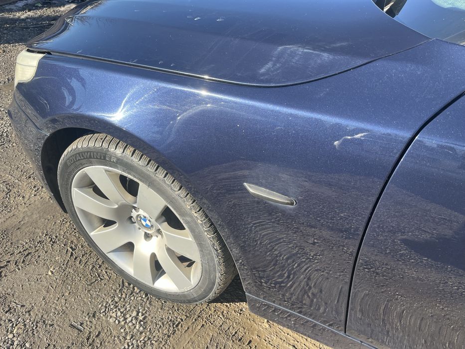 Blotnik lewy prawy bmw e60 e61 orientblau 317/5