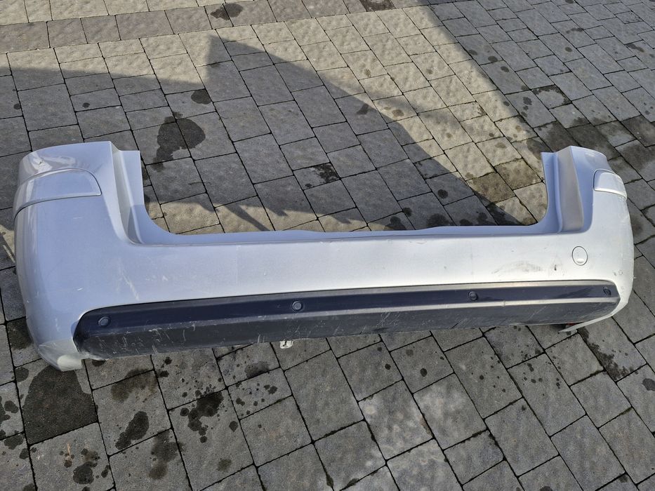 Бампер задній з парктроніками Opel Zafira B 2005-2011