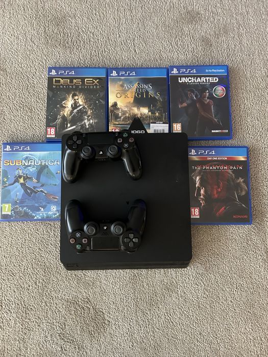 Playstation 4 slim 500gb + 2 comandos +5 jogos