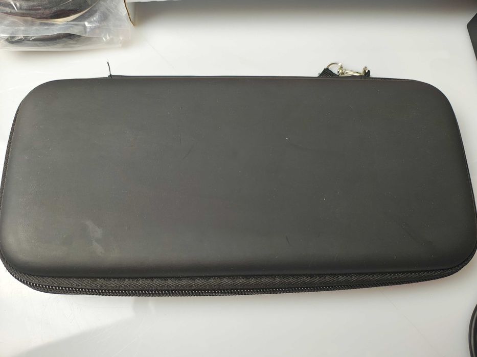 Konsola Nintendo Switch + etui + Super Mario Bross Delux bdb stan