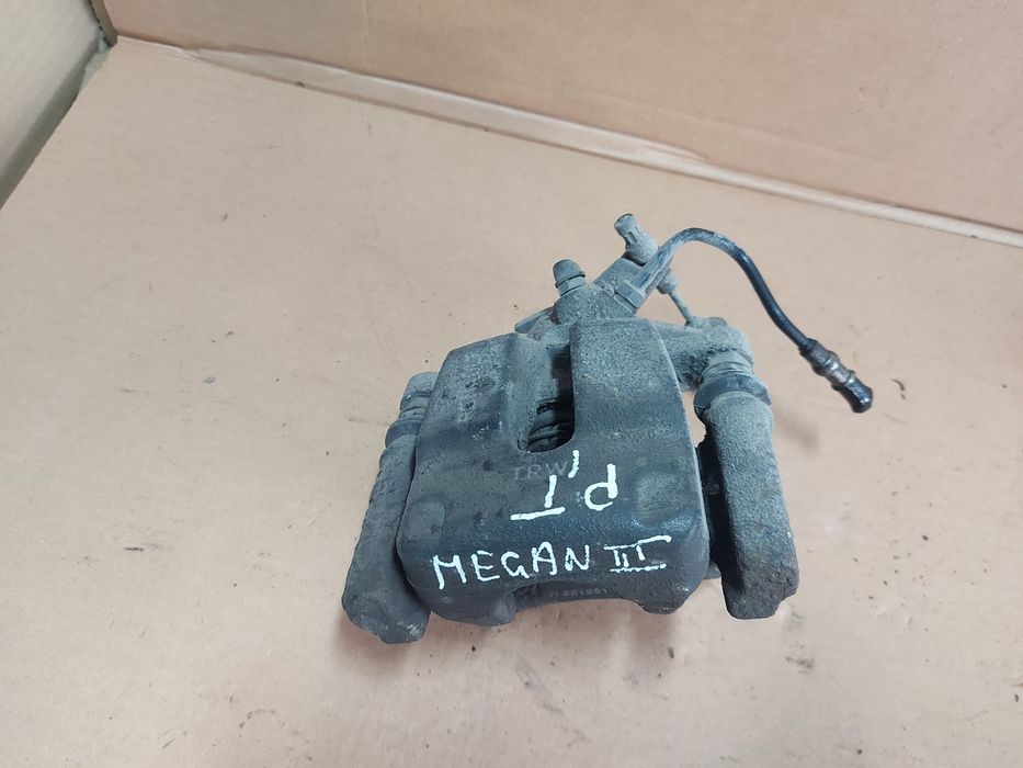 / Megane III 3 zacisk hamulcowy prawy tył