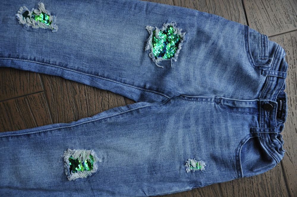 jeansy w cekiny r.152 reserved dziury