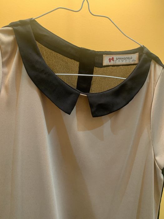 Blusa t-shirt mulher dourada/preta formal tamanho L “Springfield”