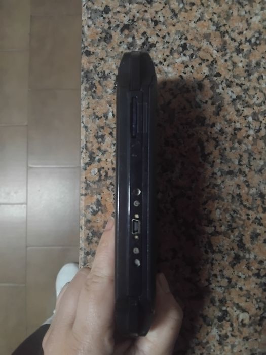 PSP E-1004 com capa e cartão de memória