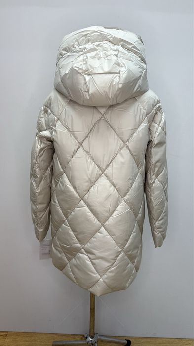 Жіночий пуховик ,є різні розміри CLASNA