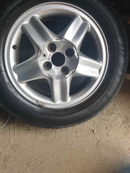 Oryginalne Alufelgi Opel 15 Komplet 4 szt. + Dekielki