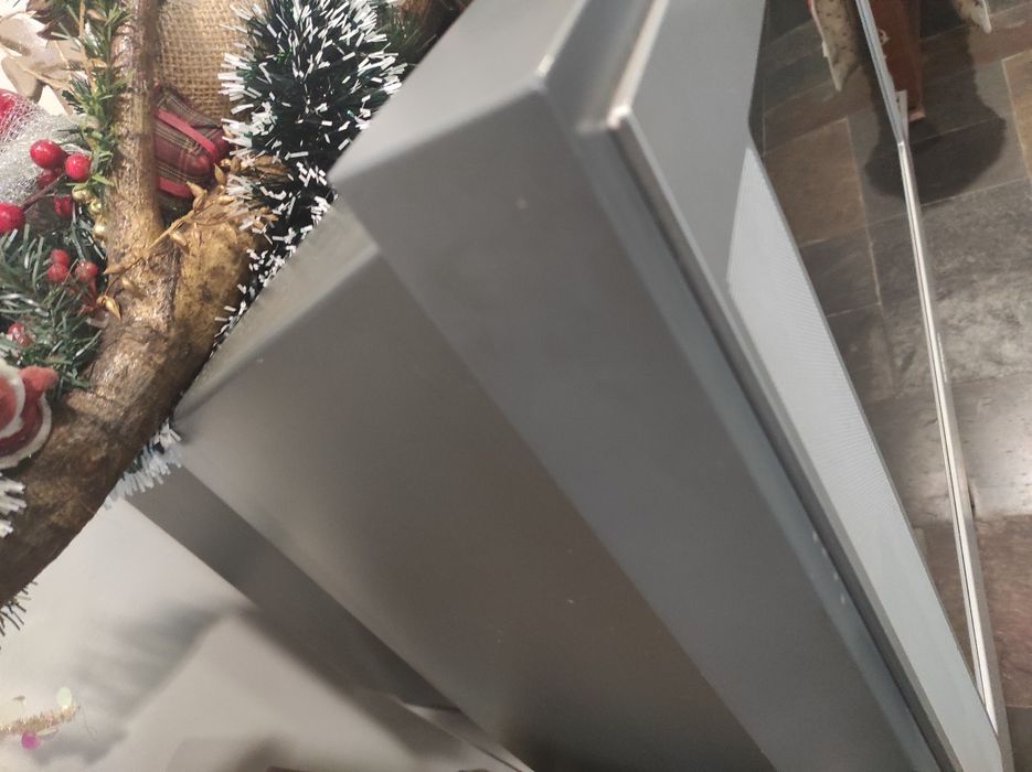 Selling a television (functional with remote control) and stand.64752024526082122