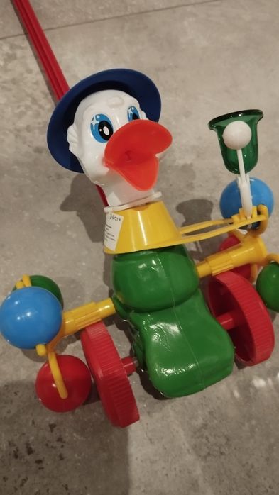 Pchacz kaczor z dzwonkiem dla dziecka jak nowy