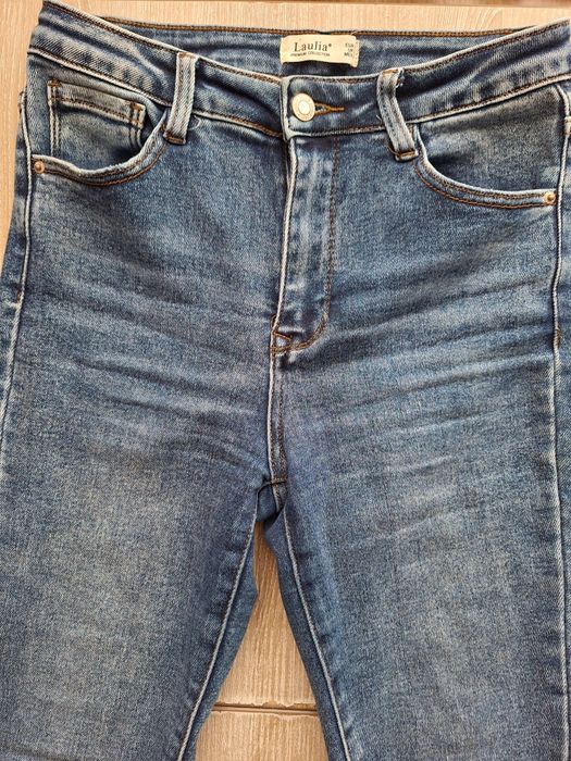 Damskie dzinsy skinny 38