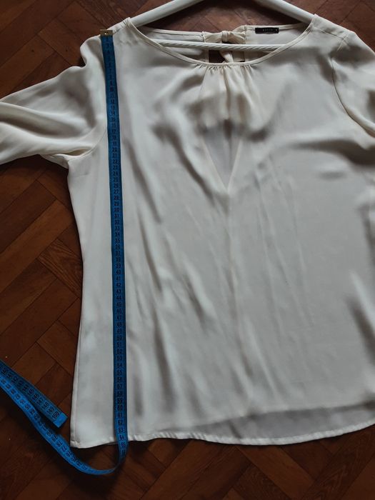 Biała elegancka bluzka damska Mohito