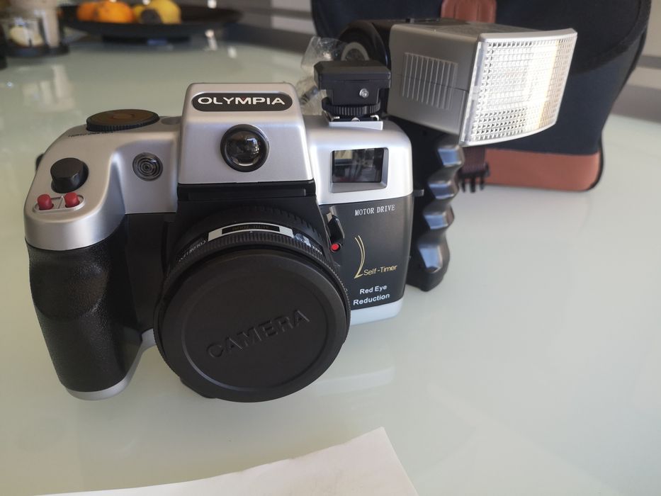 Máquina fotográfica OLYMPIA