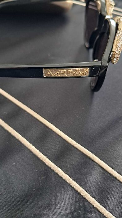 Anna dello Russo H&M okulary  krokodyle