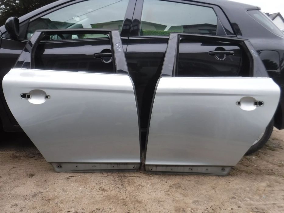 Volvo XC60 I drzwi tyl prawe lewe  szyba 477-46