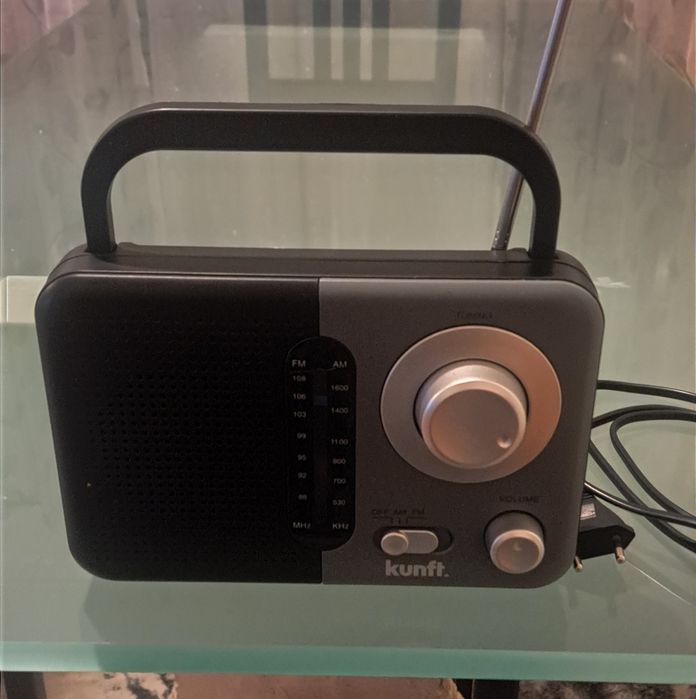 Rádio, leitor portátil de CD, mochila