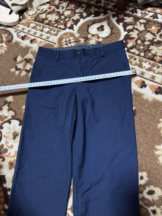 Майже нові шкільні брюки 10-12 років