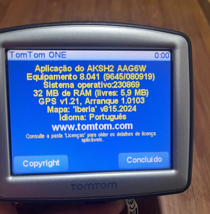 GPS tomtom e máquina fotográfica