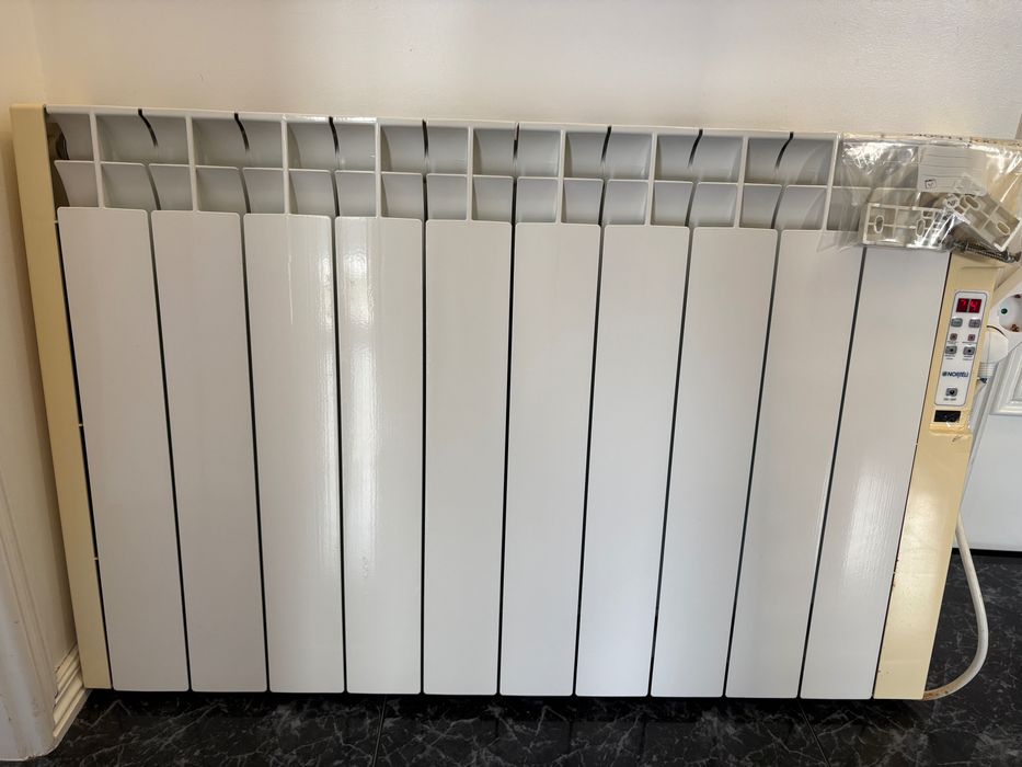 Aquecedor a óleo de parede com termoestato
