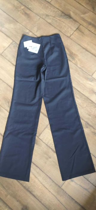 Eleganckie spodnie garniturowe szeroka nogawka