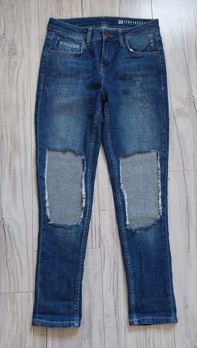 Spodnie jeans z dziurami,nowe,r.S