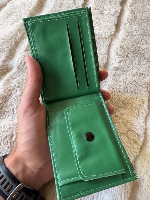 Zielony portfel goyard