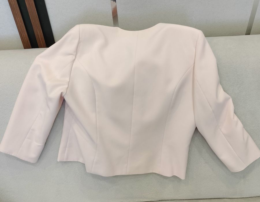 Używana elegancka marynarka w kolorze jasnego różu