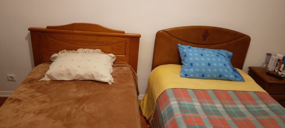 Two pine wood beds.