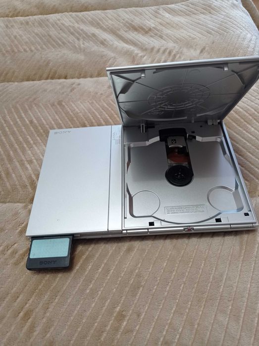 PS2 Slim Completa – 12 Jogos, 2 Comandos, Buzz e SingStar