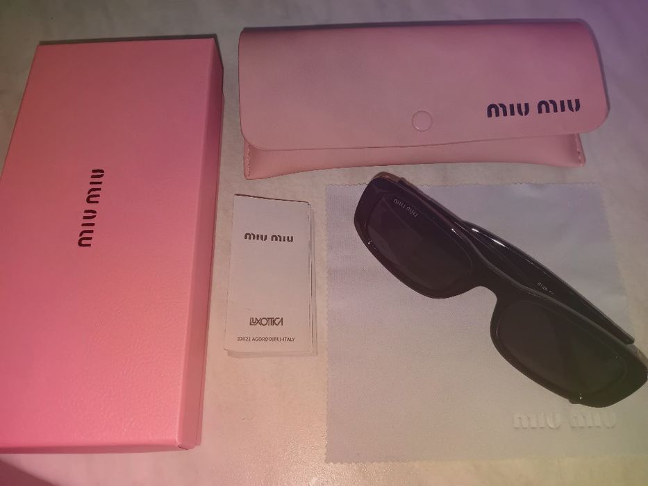 Óculos de sol miumiu